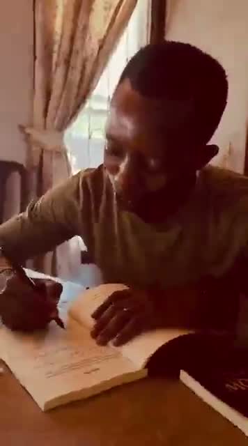Signing a copy by hand.