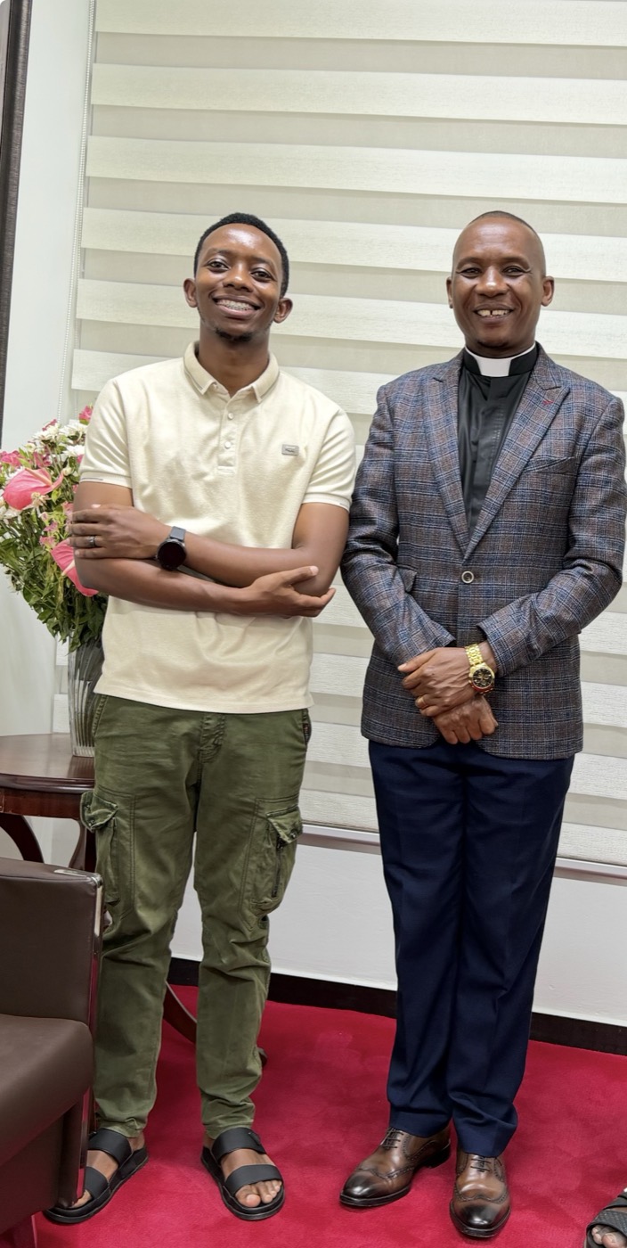 With Mchungaji Dkt. Eliona Kimaro, who reviewed both editions.